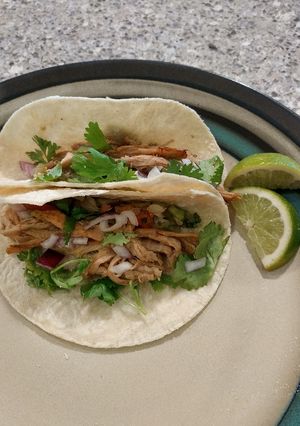 A picture of Carnitas tacos.