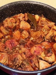 Una foto de Pollo al ajillo con llanegas