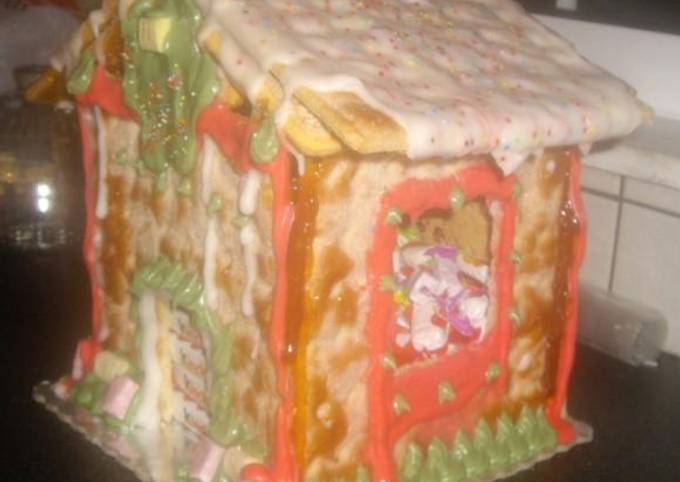 κύρια φωτογραφία συνταγής Χριστουγεννιάτικο σπίτι από σφολιάτες