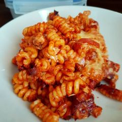 A picture of Chicken and tomato pasta bake.