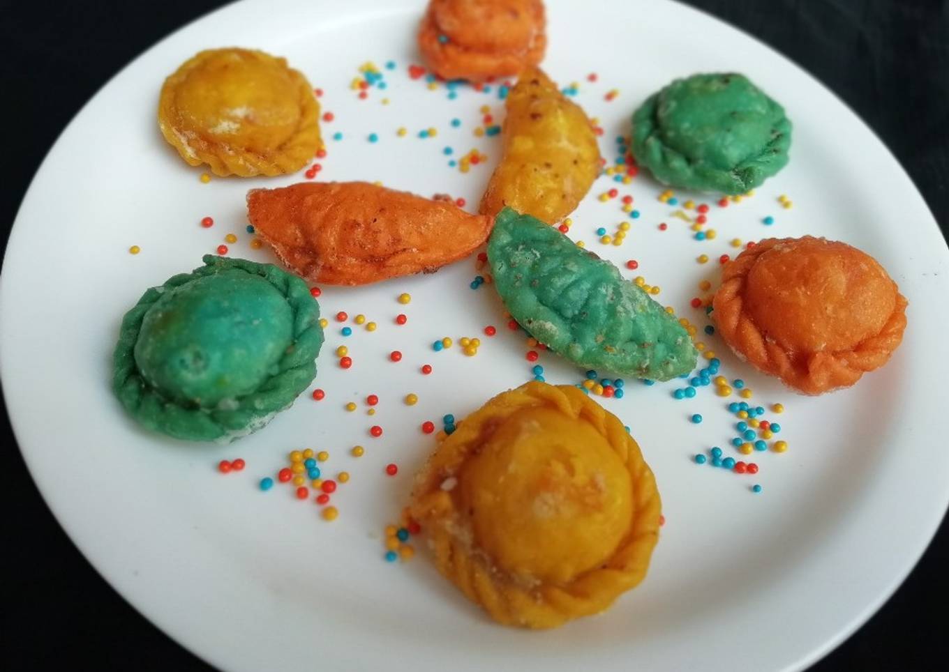 Colourful gujiya stuffed with kaju halwa