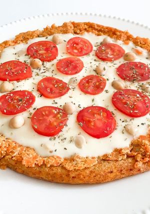 Una foto de Pizza con masa de zanahoria