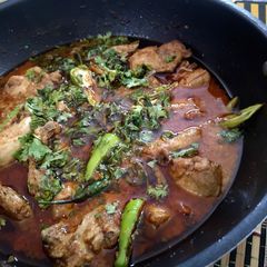 A picture of Three spice chicken karahi.