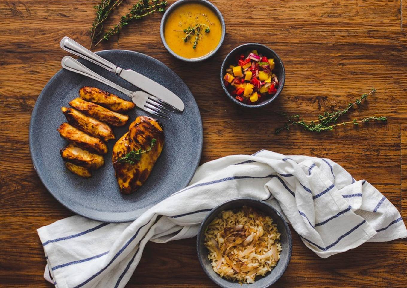 Honey & Mustard marinated Chicken with Sautéed Onion Rice, Mango Salsa and a honey & mustard sauce