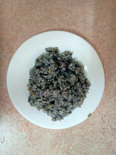 Una foto de Arroz negro con calamares