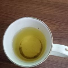 A picture of Lemon Water with a Dash of Turmeric and Black Pepper.