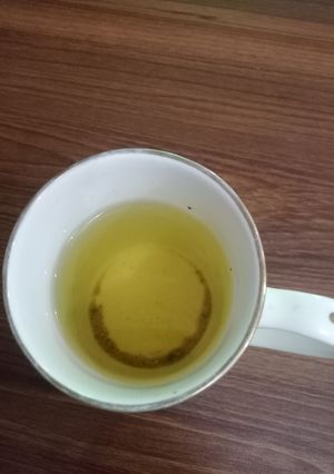 A picture of Lemon Water with a Dash of Turmeric and Black Pepper.