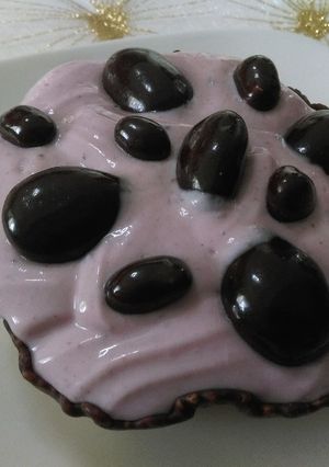 Foto principal de Tulipas de plátano y chocolates con crema de queso y moras