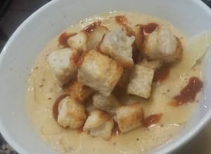 Una foto de Sopa crema de cebolla y papa