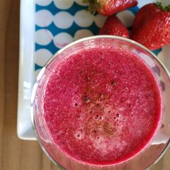A picture of Beetroot, carrot, strawberries and grapes smoothie.