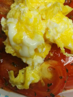 A picture of Roasted Tomatoes and Eggs.