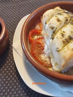 Una foto de Bacalao gratinado con papas al horno