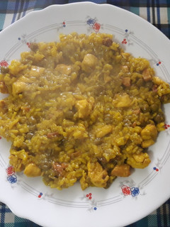 Una foto de Arroz con pollo y lomo adobado