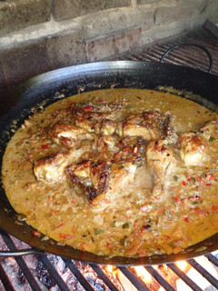 Una foto de Pollo al disco / paellera