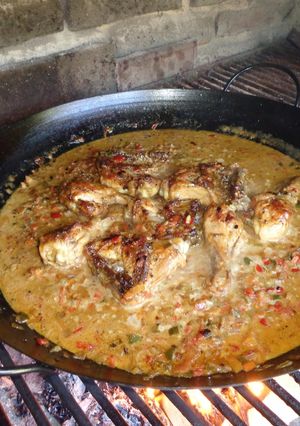 Una foto de Pollo al disco / paellera