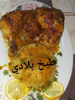 صورة لوصفة ارز في الفرن بافخاذ الدجاج