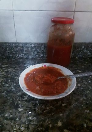 صورة لوصفة صلصة البيتزا وطريقة حفظها