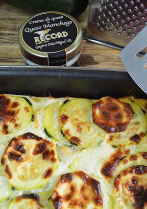 Foto principal de Calabacín con merluza y gambas y crema de queso manchego