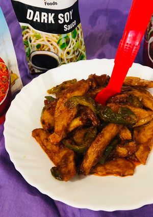 A picture of Dragon potatoes with carrots and capsicum.
