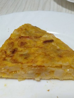 Una foto de Tortilla de cebolla y bacon