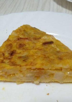 Una foto de Tortilla de cebolla y bacon