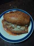 Pork Carnitas Sandwiches with Tomato Sauce and Pickled Onions, Correa Style from San Diego