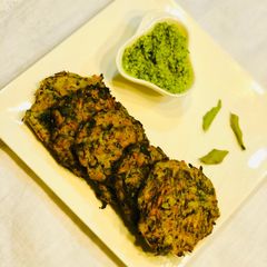 A picture of Curried carrot & zucchini fritters.