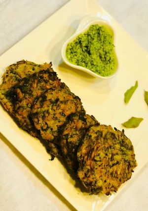 A picture of Curried carrot & zucchini fritters.
