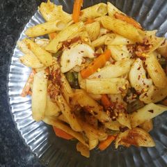A picture of Pasta in red sauce.