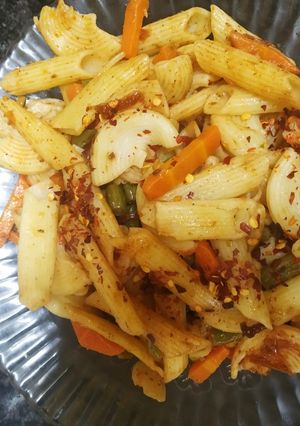 A picture of Pasta in red sauce.
