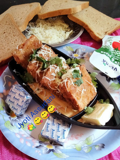 A picture of Bread cheese Bites(mini cheese sandwich).