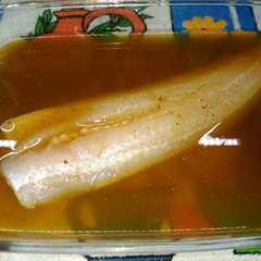 A picture of Pescado marinado con miel y curry.