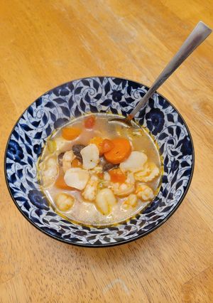 A picture of Shrimp and White Fish Soup with Gnocchi.