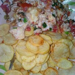 A picture of Crispy potatoes chips with garlic scrambled egg.