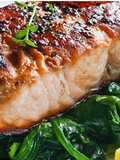 Salmon with thyme on bed of spinach