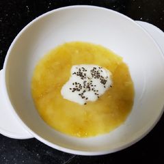 A picture of Banana yogurt with chia seeds for baby.