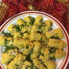A picture of Khandwi Rolls.