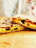 Calzoni con lievito madre alla zucca montasio e olive taggiasche