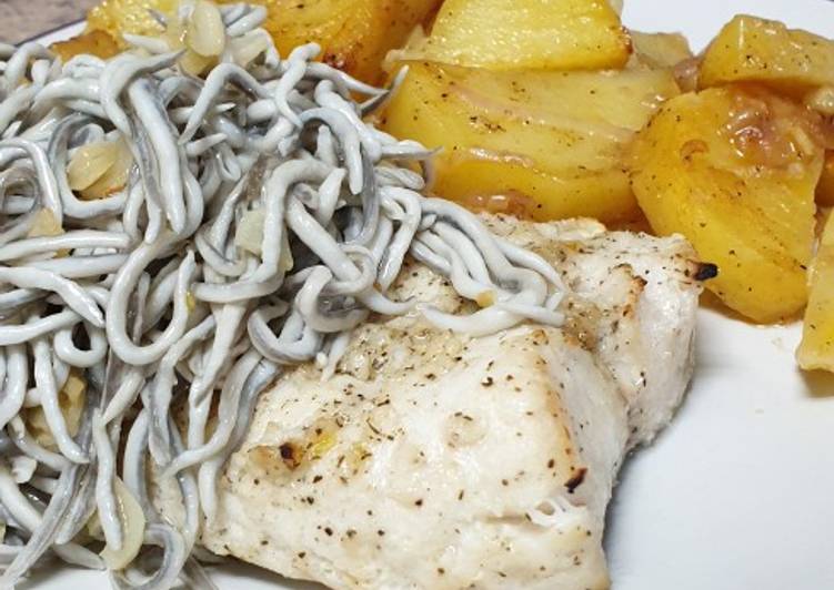 Merluza al ajo con topping de gulas