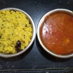 A picture of Vaghareli Khichdi with Tomato Vagharyu.