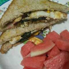 A picture of Sandwich putih telur + bayam merah.