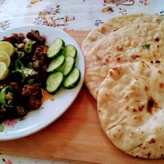 A picture of Fried kelaji with tawa naan.