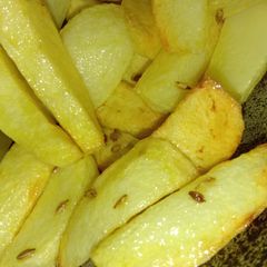 Fried cumin potatoes slices A picture of Fried cumin potatoes slices.