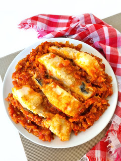 Una foto de Bacalao con tomate