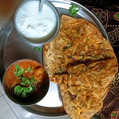 A picture of Pyaaz Paratha kachori Style.
