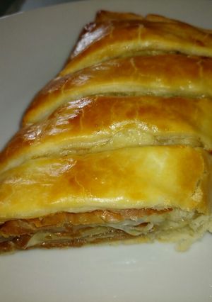 A picture of Parma ham and smoked cheese roll up pie.