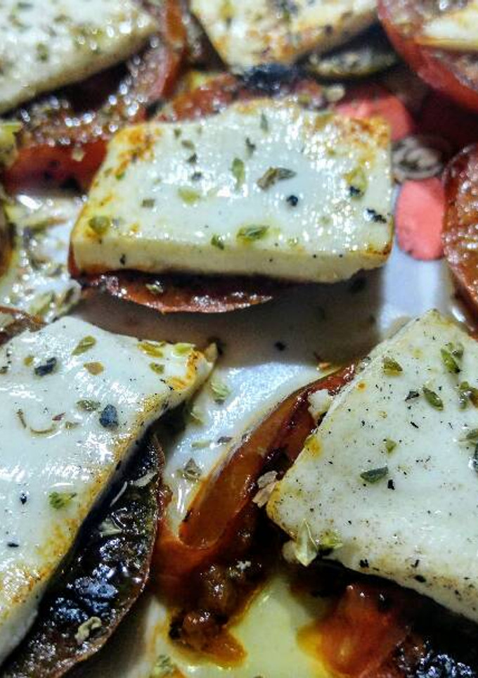 Una foto de Ensalada caliente de tomate