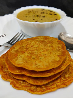 A picture of Savoury pancakes (wheat flour - carrot pancakes with chutney).