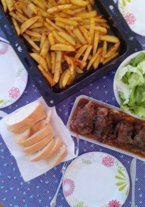 A picture of Short ribs with paprika crusted potatoes.