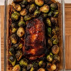 A picture of Honey-Glazed Pork Ribs with Roasted Brussels Sprouts.
